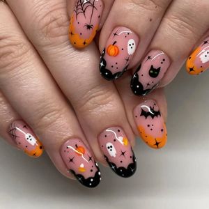 Unghie finte 24 pezzi rosa Halloween gradiente amore zucca scheletro disegni indossabili falsi stampa sulla copertura completa manicure punta per unghie 231017