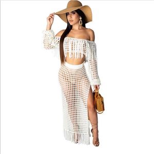 Sexig långärmad klänningar strandkläder omslag i ihålig baddräkt kvinnliga badare Tassel Beach Summer Crochet Dress275T