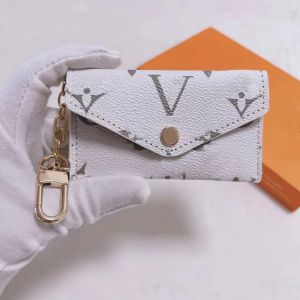 Luxur Designer KeyChain Fashion Womens Mini Wallet Högkvalitativ äkta läder Män mynt Purse Färgplånar Holder Love