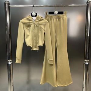 Pantaloni a due pezzi da donna BORVEMAYS 2023 Autunno Colletto con cappuccio Manica lunga Cerniera Cappotto casual Stretch Vita alta Gamba larga Set a due pezzi WZ5287