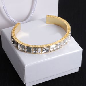 Designerarmband, guld manschett inbäddade kristall, elegant kvinnors armband, högkvalitativ gåva