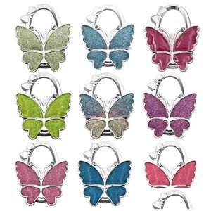 Ganci Rotaie Gancio Farfalla Gancio per borsa Tavolo pieghevole opaco lucido per borsa Borsa Fy3424 0605 Consegna goccia Giardino domestico Housekee Dhwdw