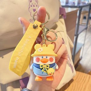 Söt ryggsäck Duck KeyChain Cartoon Adhesive Doll Personlig bil Keyring Parväska hängande dekoration liten gåva