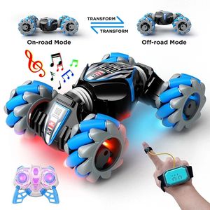 Druckgussmodell Neuestes 4WD-Fernbedienungs-Stuntauto 2 4G Wireless RC Drift LED-Leuchten Uhr Gestensensor rotierendes Kinderspielzeug Geschenk 231017