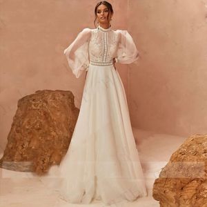 Sukienki ślubne Boho vestidos de boda 2023 Długie rękawy puchowe A-line panny młodej Suknie wysokie szyi koronkowe aplikacje