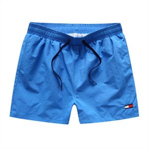 Shorts tommhilfigers designer de moda de luxo homem verão novos shorts em linha reta calças esportivas dos homens na moda trimestres cor sólida shorts soltos