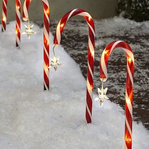 Juldekorationer 8st utomhus juldekorationer Solar Candy Cane Lights Waterproof LED Garden Path Lawn Light Xmas Year's Decor 231017