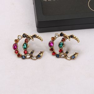 Berömda G Letters Designer dinglar örhängen med Crystal Pearl Big Long Ear Rings smycken Kvinnor Rödgrön vit gul färgglada stenörhängen örhängen