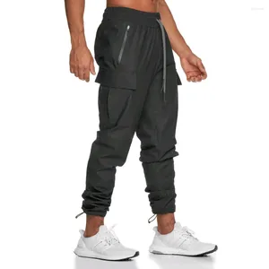 Herrbyxor som kör jogger Sweatpants Man Nylon Gym Workout Fitness Manlig mode Multifickor andningsbara byxor