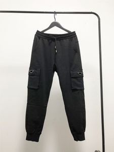 2023 Erkek Pantolon Klasik Tasarımcı Mink Yün Pantolon Pantolon Naylon Versiyon Çok Bütçe Tasarım Üçgen Dekorasyon Mektubu Deseni Temiz Fleecing Jogger Dipler