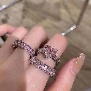 Ins Dolce e carino Anelli nuziali Gioielli di moda Argento sterling 925 Riempimento a forma di cuore Topazio rosa Pietre preziose di diamanti CZ Promessa Eternità245A