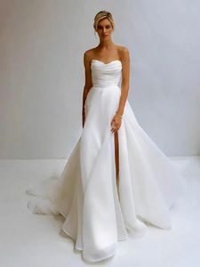 Bröllopsklänningar vita brudklänningar elfenben organza ny dragkedja plus storlek anpassad snörning lårhöga slitsar golvlängd ärmlös en linje älskling