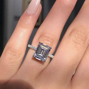 Uttalande ring 925 Sterling Silver Princess Cut Diamond Engagement Wedding Band Rings for Women Men Party Jewelry Gift279d