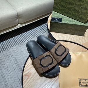 Luxury Womens Designer Flat Bottom tofflor Famous Interlocking Letter Tryckt varumärke Sandaler Importerade duk yta