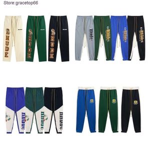 Mens Pants Designer Rhude Cargo Sweatpants for Man and Women Casual Fitness Workout New Style Trousersatdr