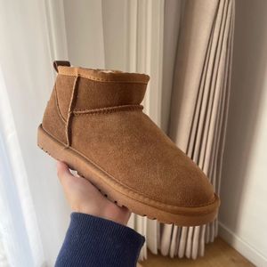 Buty skórzane futrzane buty śnieżne dla kobiet mężczyzn Ultra mini zima płaska kostka buty damskie duże rozmiar klasyczny moda ciepły prezent darmowy statek 231019