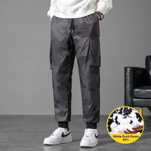 Calças masculinas 90 para baixo calça homens inverno calças ao ar livre macho grosso quente acolchoado fundo de neve mulheres outwear à prova de vento oversize 231020