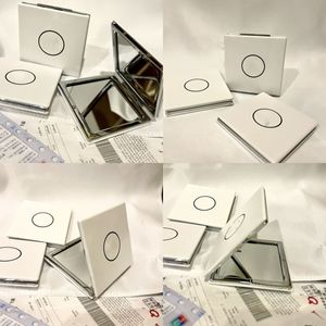 Novos espelhos compactos branco pu couro menina maquiagem moda designer espelhos dobráveis ampliar espelho carta impressa ferramentas de maquiagem acessórios de estilo clássico portátil