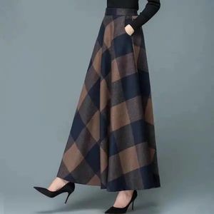 التنانير النسائية ملابس الملابس الخريف والشتاء مزاج متعدد الأزياء البساطة الأزياء التنقل عالية الخصر تنورة ألين 231019