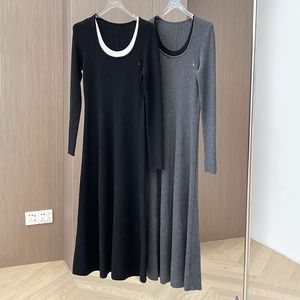 Pure wool dress with letter brooch decoration, color matching U-neck, designer wool knit dress