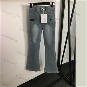 Jeans da donna in ferro trapano lettera design tasca con lettera jeans blu svasati casual a vita alta