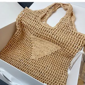 Bolso de diseñador 10A, bolso de paja de lujo a la moda, bolso de compras, bolso cruzado con forma de cubo dorado, bolso de mano para mujer