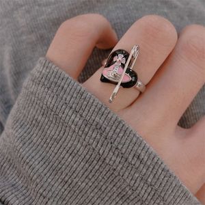 Designer high qualityThe Empress Dowager's Black Pink Love Ring is a high-end sweet and cool personality ring. A female paper clip with an open flower ring bracelet