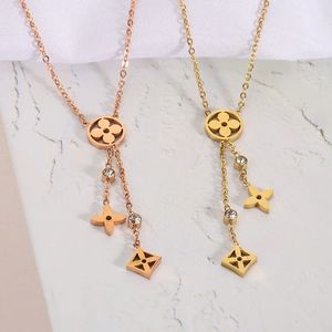 Brand fashion fringe four/clover titanium steel necklace Women's 18K gold light luxury hollow-out personality necklace
