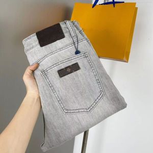 Designer Fashion Men's Floral Letter Jeans Slim Stretch Wear Wear Resistant Top Row Patch Motorcykel Vintage Business Pants