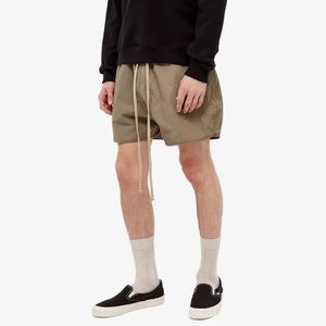 High street korta män kvinnor sommar nya shorts varm bokstav tryckt byxa löst mjuka och bekväma kostymer gatakläder kläder snabb torkbyxor storlek m-3xl brun grön