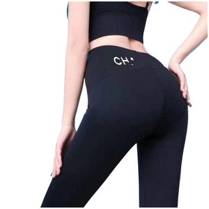 Pantaloni leggings sportivi da yoga con stampa di lettere aderenti a tunica elastica in vita da donna SMLXL