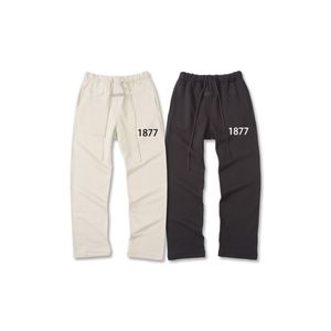 Essentialfelpe con cappuccio 1977 tuta da uomo pantaloni della tuta pantaloni della tuta a gamba larga Pantaloni della tuta firmati unisex ESS Stampa Pantaloni sportivi Hip Hop Abbigliamento essenziale Essen Streetwear