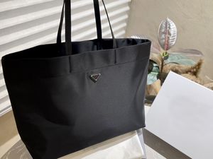 A sacola de alta qualidade designer bolsa bolsa único totes homem mulher saco casual lona moda bolsa ombro crossbody saco compras