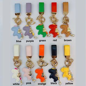 2023Andmade مصمم مفاتيح مفاتيح Dragonne Multicolor سلسلة مفاتيح النساء الرجال البني الجلود حقيبة محفظة حبل الذهب مطلي بالذهب الذهب دراجون