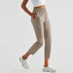 Aktif Pantolon Logo ile Gevşek Sporları Nefes Alabilir Hızlı Kuruyan Cep Dış Mekan Koşu Kalça Yoga Eğitim Kadınlar için Fitness