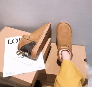 Classical Women Ultra Mini snow boots comfortable Sheepskin keep warm boots with card dustbag hot sell L and U Casual mini Shoes Beautiful gifts