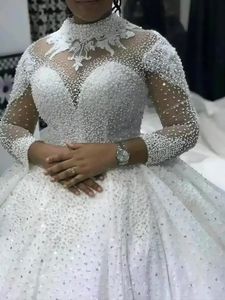 Afrikansk bröllopsklänning av hög kvalitet 2024 Illusion High Neck Lace Pearls Pärlor Långa ärmar Brudklänningar Vestidos de Noiva Custom Made Made