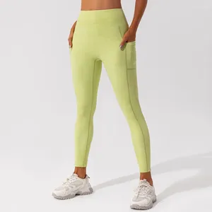 Calças ativas esportivas femininas fitness bolso yoga nu sólido cintura alta hip levantamento de secagem rápida collants correndo ginásio treino leggings