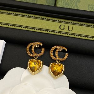 Utan låda kvinnor designer studörhängen g bokstav gul diamant original logotyp tryckt lyx mässing örhängen valentin gåvor