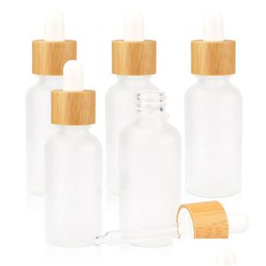 Bottiglie contagocce all'ingrosso 10 ml 20 ml 30 ml bottiglie contagocce in vetro smerigliato olio essenziale e coperchi di bambù per fiale campione essenza liquida C Dhqnd