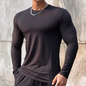 Men's T-skjortor 2023 Fitness T-shirt Män avslappnad långärmad mager skjorta manlig kroppsbyggande tees toppar som kör sport snabb torr träning