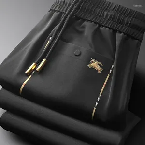 Męskie spodnie wiosna jesienna haft haftowy swobodny joggingowe spodnie dresowe moda luźne spodnie wysokiej jakości streetwear biznesowy