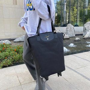 Duffel Bags Universal Wheel Travel Bag Women's Shopping Stora kapacitet Justerbar handväska vikbar bagage Kort avstånd Vattentät