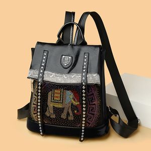 Ladies shoulder bags 4 colors creative graffiti cartoon fashion leather handbag punk wind heavy rhinestone backpack street personality rivet crossbody bag 2115#