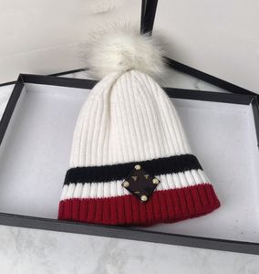 Autumn and Winter Thickening Earflaps Warm Woolen Cap Korean Fashion Fox and Racoon Fur Ball Knitted Hat Fashion