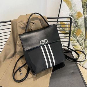 wholesale shoulder bag simple and versatile waterproof Oxford casual backpack flip lightweight leather student backpack this year's popular striped handbag 669#