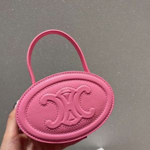 Designer de alta qualidade celinne novo saco mesmo arco triunfal mini portátil triomphes saco redondo bolo saco de couro versátil rosa mooncake saco zero carteira