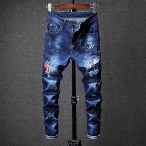 Män trycker jeans trycker denim byxor casual fashionabla blyertsbyxor mitt i midjan färgglad230t