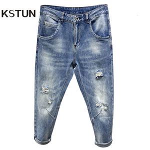 Zgrane jasnoniebieskie rozciągające spodnie haremowe Mężczyzny Przycięte spodnie do kostki Długość w trudnej sytuacji strzępione dżinsy hip hopowe Ubrania