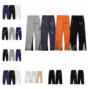 Pantaloni da uomo nuovi designer Pantaloni sportivi Pantaloni con stampa di lettere maculate Pantaloni da donna allentati versatili Pantaloni casual dritti Splash Ink Graffiti Pantaloni micro svasati